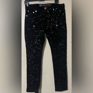 Demolition denim black paint splatter jeans